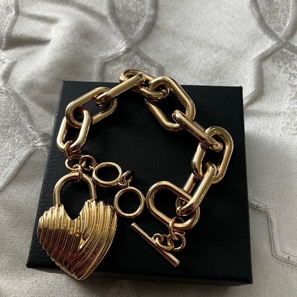 Gold Heart Charm Bracelet. Add a touch of flair to your basic look. - Picture 3 of 8